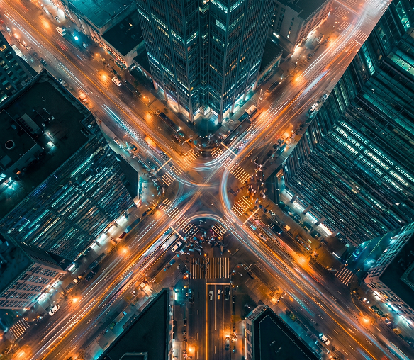 Aerial view of a city intersection at night, KHP Marketing & Growth