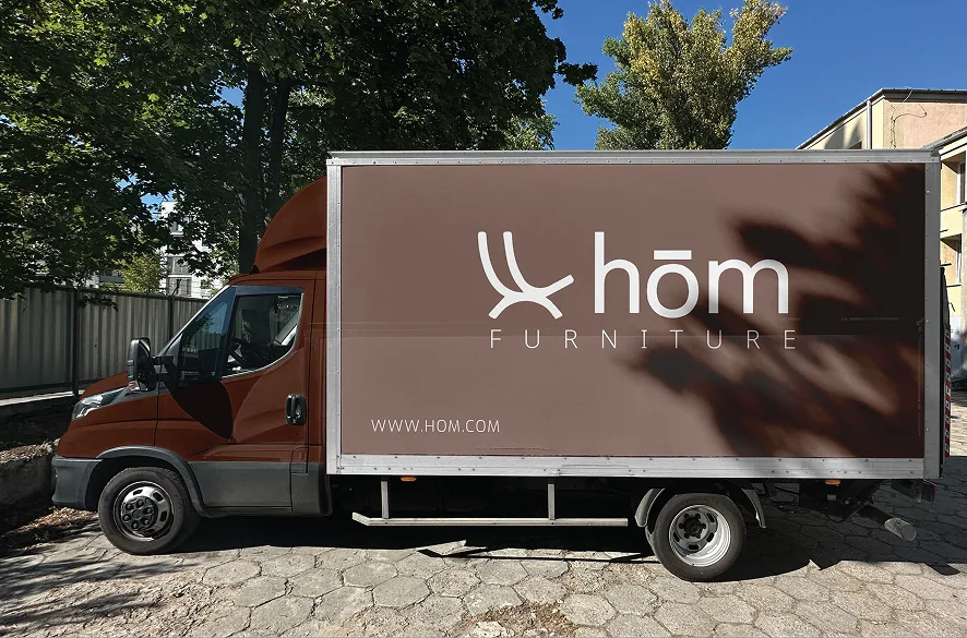 A hōm delivery truck in the brand's livery