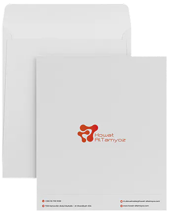 A white Howat Al Tamyoz presentation folder in front of its envelope