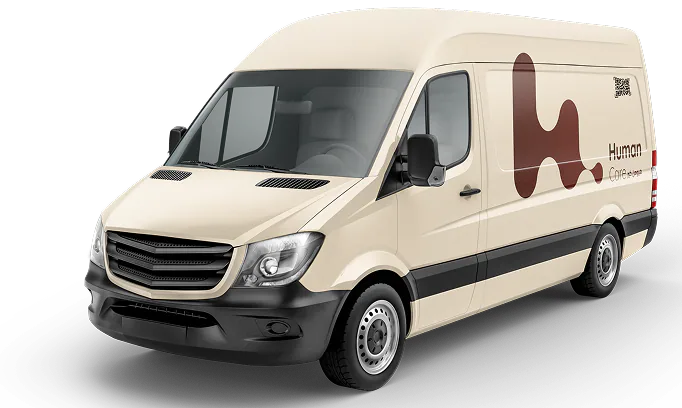 A Human Care delivery van liveried with the brand mark
