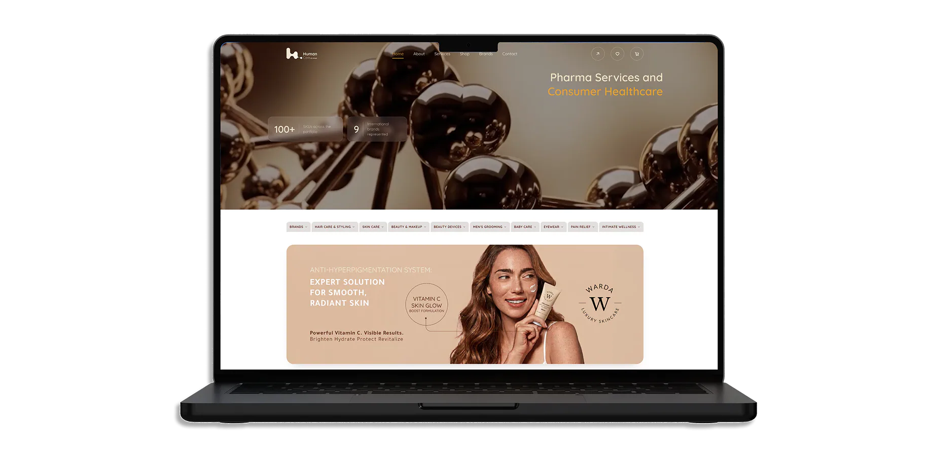 The Human Care site open on a laptop: Pharma Services and Consumer Healthcare, over a lit brand hero