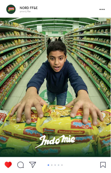 Indomie post: a boy reaching for Indomie packs down a supermarket aisle