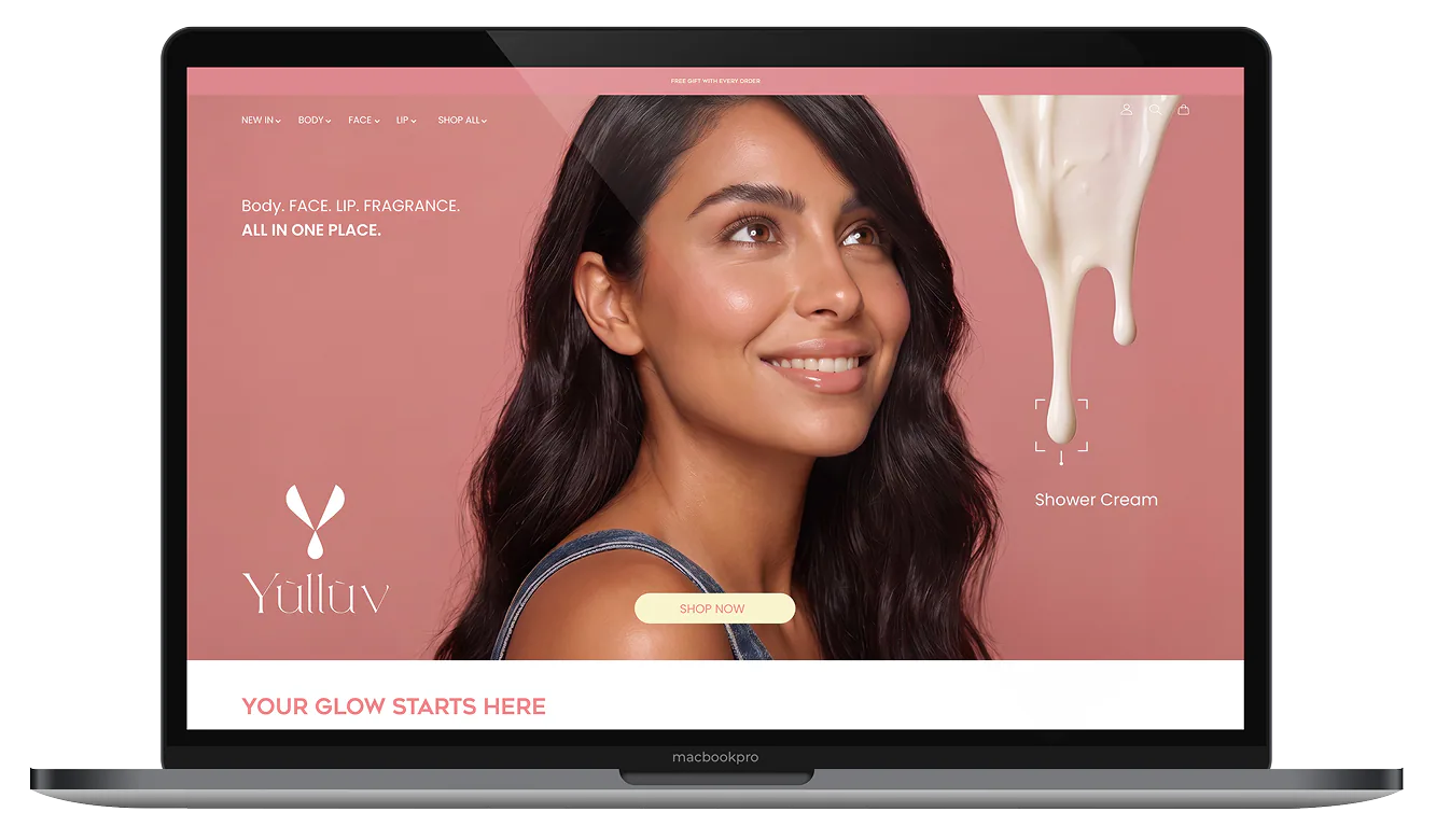 The Yulluv online store shown on a MacBook, featuring its pink skincare campaign